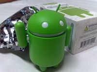 220px-Android green figure2C next to its original packaging